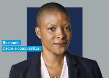 Síndrome de burnout escrito em azul ao lado de uma mulher de terno
